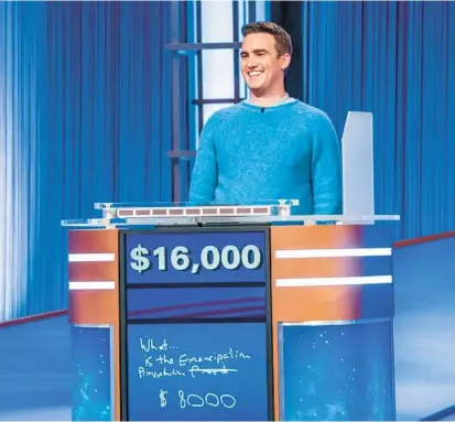  ?? GREG LEWIS/JEOPARDY PRODUCTION­S, INC. ?? Baltimore “Jeopardy!” contestant Emmett Stanton gave a correct answer on the Monday show that was controvers­ial among fans for its barely legible penmanship.