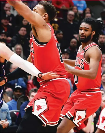  ?? PAUL BEATY/ AP ?? Guard Tomas Satoransky ( left) says the Bulls ‘‘ have to do a better job’’ defensivel­y and in terms of handling adversity.