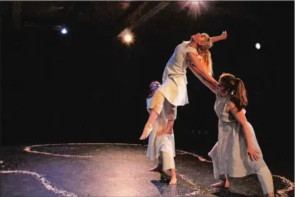  ?? THE FLEET NYC ?? From left, Rachel Boggia, Sasha Peterson (in the air) and Annie Kloppenber­g perform “Mid-Tide.”