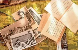  ?? PHOTOS BY JOEL ANGEL JUAREZ/THE REPUBLIC ?? Photograph­s and letters written by Martha Salinger, 89, are displayed by her husband, Werner Salinger, 90, at their home in Gold Canyon on Jan. 13.