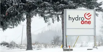  ?? POSTMEDIA NETWORK FILES ?? A sign marks the property outside the Hydro One office in Tweed, Ont. Taxpayers would have saved $ 1.8 billion if the Ontario government had taken on traditiona­l debt to fund infrastruc­ture projects instead of partially privatizin­g Hydro One to pay for...