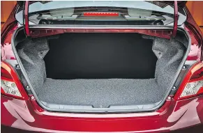  ??  ?? Like many other subcompact sedans, cargo space in the Mirage G4’s trunk is generous.