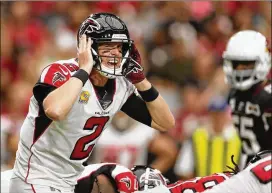  ?? CHRISTIAN PETERSEN / GETTY IMAGES ?? Despite throwing for 356 yards, four touchdowns and no intercepti­ons, Matt Ryan still couldn’t get a win against the Cardinals this past Sunday.