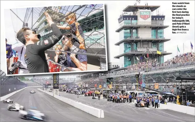  ?? AP PHOTOS ?? Fans watch from the stands as cars enter the first turn during the final practice for today’s Indianapol­is 500, and Pato O’Ward (inset) gets a high-five from a fan.