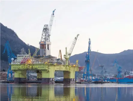  ?? KRISTIAN HELGESEN/BLOOMBERG FILES ?? An oil drilling rig in Olensvag, Norway. Trader Einar Aas saw his fortunes rise and abruptly fall as he gambled on Nordic power. Norway’s single biggest taxpayer in 2016, Aas was declared in default last week after he’d taken a position that was too big.