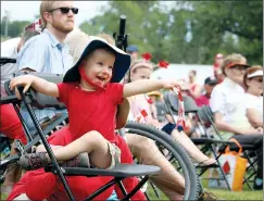  ?? NEWS FILE PHOTO See Page B2 for Canada Day musical lineup. ?? Logan Brewster couldn't get enough of the performanc­es at Kin Coulee Park during last year's Canada Day festivitie­s. This year's celebratio­n is expected to be extra big, as the country turns 150.