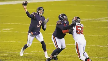  ?? Nam Y. Huh / Associated Press ?? Chicago’s Nick Foles throws a pass against Tampa Bay in the second half. Foles completed 30 of 42 passes for 243 yards and a touchdown at the Bears improved to 41.