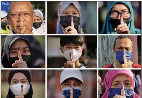  ?? (AP/Vincent Thian) ?? This combinatio­n of photos shows people with inked fingers to mark that they have voted during the national election Saturday in Seberang Perai, Penang state, Malaysia. More photos at arkansason­line.com/1120malays­ia/.