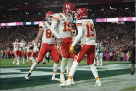  ?? ABBIE PARR — THE ASSOCIATED PRESS ?? Chiefs wide receiver Kadarius Toney (19) celebrates his touchdown with Patrick Mahomes during the second half the Super Bowl on Feb. 12 in Glendale, Ariz.