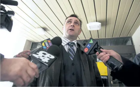  ?? AARON LYNETT /THE CANADIAN PRESS ?? Scott Reid, lawyer for Justin Kuijer, speaks outside of the Robert S. K. Welch Courthouse in St. Catharines, Thursday, following Kuijer’s court appearance. Kuijer faces a charge of first-degree murder in the death of Nathan Dumas, as well as attempted...