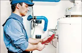  ?? DREAMSTIME/TRIBUNE NEWS SERVICE ?? Regular flushing is an essential element of water heater maintenanc­e.