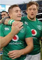  ?? INPHO ?? Job well done: Ireland’s Andrew Porter congratula­tes Jordan Larmour after the game