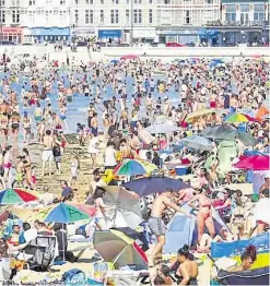  ??  ?? Public health directors James Williams, left, and Andrew Scott-Clark; (right) crowds on Margate beach last month