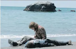  ?? THE CANADIAN PRESS ?? Daniel Radcliffe plays a flatulent corpse that washes up on a deserted shore inhabited by Paul Dano’s character in the film Swiss Army Man.