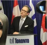  ?? TORONTO STAR FILE PHOTO ?? Toronto Deputy Mayor Denzil Minnan-Wong talks to reporters in 2016. Minnan-Wong is running for a provincial seat while keeping his city councillor job, as are Shelley Carroll and Chin Lee.