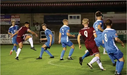  ?? Picture: Jenny Short ?? A Paulton Rovers player gets a shot away during Tuesday night’s 4-1 victory against Highworth Town in the Southern League Challenge Cup