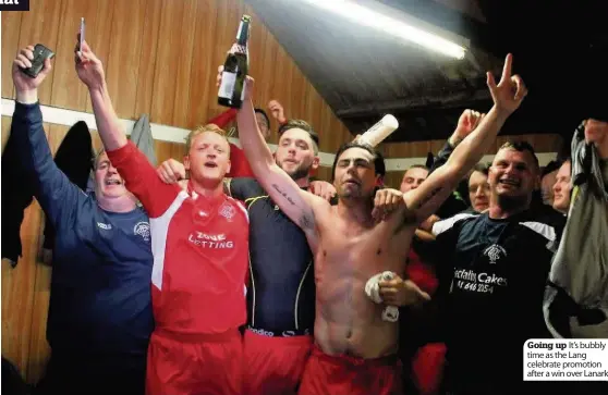  ??  ?? Going up It’s bubbly time as the Lang celebrate promotion after a win over Lanark