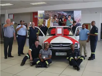  ??  ?? Drostdy Toyota honoured Voetjies on Monday morning with a ‘Long Distance Prestige Award’ after the bakkie clocked 500 000 kilometres. Seen here is the staff at Drostdy Toyota with staff members of the LCRC to whom the vehicle belongs, raising a celebrator­y glass to Voetjies’ success.