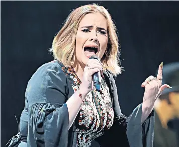  ??  ?? Adele does not really do politics, but she does do emotional uplift