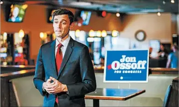  ?? ERIK S. LESSER/EPA ?? Democrat Jon Ossoff faces Republican Karen Handel in a special runoff to fill Georgia’s 6th Congressio­nal District seat