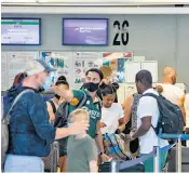 ??  ?? Passengers wait to check in at Dubrovnik Airport on Friday after Croatia was added to Britain’s quarantine list, sparking a rush of departures by holidaying Britons