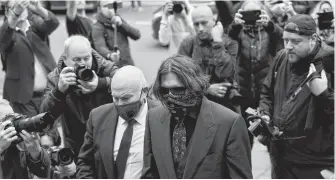  ?? TOBY MELVILLE REUTERS ?? Actor Johnny Depp arrives at the High Court in London on July 9, 2020.