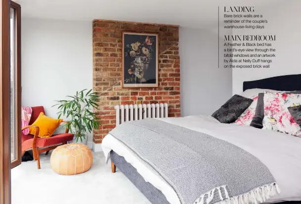  ??  ?? LANDING
Bare brick walls are a reminder of the couple’s warehouse-living days
MAIN BEDROOM A Feather & Black bed has a bird’s-eye view through the bifold windows and an artwork by Aida at Nelly Duff hangs on the exposed brick wall