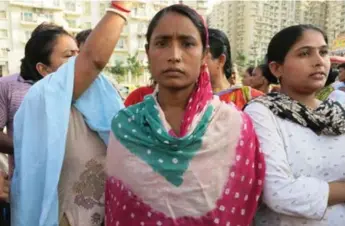  ?? VIDHI DOSHI/THE WASHINGTON POST ?? Haseena Bibi, front, and other maids rioted because they believed a fellow worker was being mistreated.
