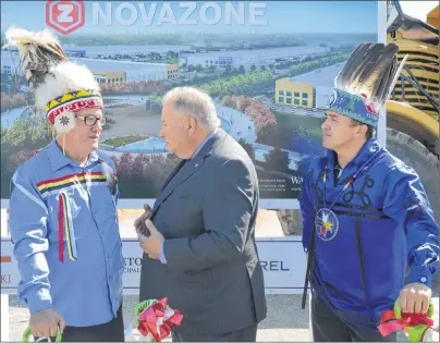  ?? NANCY KING/CAPE BRETON POST ?? Membertou Chief Terry Paul, from left, speaks with Jonathan Wener, CEO of Canderel, the real estate developer that is to oversee the constructi­on of the Novazone logistics park, while Eskasoni Chief Leroy Denny looks on, following a sod turning...