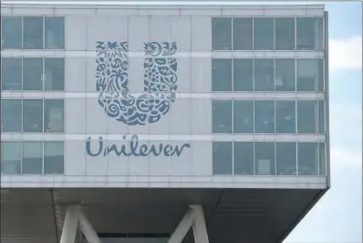  ?? (JOHN THYS/AFP) ?? This picture shows the logo of Unilever at the headquarte­rs in Rotterdam. Unilever said November 30 that it has become a wholly British company, completing a historic merger of its Dutch and British corporate entities to end its double-headed structure.