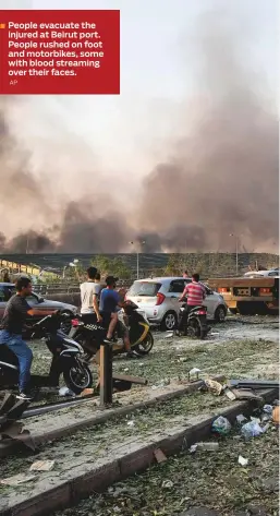  ?? AP ?? People evacuate the injured at Beirut port. People rushed on foot and motorbikes, some with blood streaming over their faces.