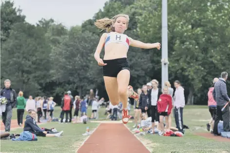  ??  ?? Emma Hornsby picked up a second successive match award for her win in the long jump.