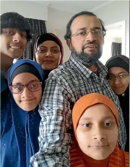  ??  ?? The Zafar family take a selfie before they break their Ramadan fast. From left, Salman, Alina, mum Saba, dad Imran, Fiza and, in front, Suniya.
