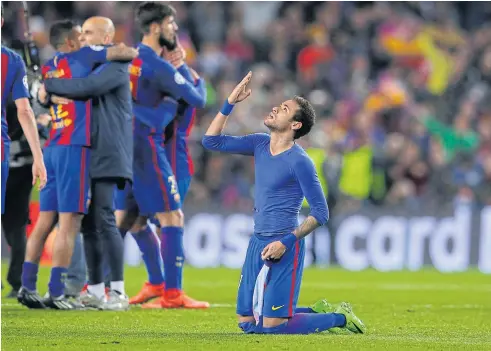  ??  ?? Barcelona’s Neymar celebrates at the end of the match against Paris Saint-Germain at the Camp Nou on Wednesday.