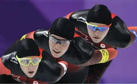  ?? PETR DAVID JOSEK/THE ASSOCIATED PRESS ?? Canada’s Ivanie Blondin, front, Josie Morrison, centre, and Isabelle Weidemann easily beat Germany in their team pursuit pairing Monday.