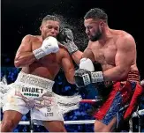  ?? ?? Joseph Parker, right, dealt out damage of his own in his fight against Joe Joyce.