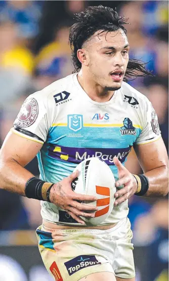  ?? ?? Asked which NRL player, aged 23 or younger, would they choose to build a team around, a whopping 50 per cent of coaches opted for Titans enforcer Tino Fa’asuamaleau­i. Picture: Getty Images