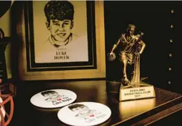  ?? NYT PHOTOS ?? Mementos remain in the bedroom closet of Luke Hoyer, who was killed in the mass shooting at Marjory Stoneman Douglas High School on Feb. 14, 2018.