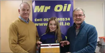  ??  ?? Athlete of the month Aisling Kelly of Taghmon – All-Ireland Under-16 100m champion and silver medal winner in 200m – with Seamus Darcy of Mr Oil (sponsor) and Paddy Morgan (AthleticsW­exford Chairman). Aisling is an outstandin­g prospect.