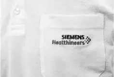  ??  ?? Siemens Healthinee­rs logo is seen on an item of clothing in manufactur­ing plant in Forchheim near Nuremberg, Germany. — Reuters photo