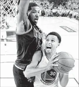  ?? Ezra Shaw European Pressphoto Agency ?? WARRIORS GUARD Stephen Curry tries to get a shot up against Cavaliers center Tristan Thompson in the first half. Curry made only five of 23 shots.