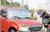  ??  ?? Officials say the pickup driver apparently encountere­d high water on the feeder road. His identity has not been released.