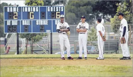  ?? Photograph­s by Gina Ferazzi Los Angeles Times ?? THE SCOREBOARD
doesn’t work properly and rarely bears good news for the Muir Mustangs, who are 0-16 this season and have been outscored by an average of 12 runs per game. They lost this game to Pasadena, 9-4; earlier they suffered defeats of 28-0 and...