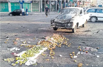  ?? AMMAR SAFARJALAN­I/XINHUA/TRIBUNE NEWS SERVICES ?? The bombings in the city of Sweida on Wednesday included a motorcycle bomber who struck at a busy vegetable market.