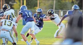  ?? / Jeremy Stewart ?? Model’s Coco Dublin (2) tries to break away from a North Murray defender on a run during a game Friday, Aug. 31, 2018, at Model High School.