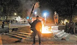  ?? BETH NAKAMURA/AP ?? Protesters gather during a demonstrat­ion against racism Thursday in Portland, Oregon.