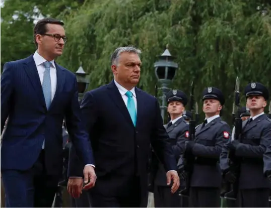  ?? KACPER PEMPEL, REUTERS / NTB SCANPIX ?? Polens statsminis­ter Mateusz Morawiecki møtte Ungarns statminist­er Viktor Orban in Warsaw i Polen i mai i år. Begge skaper bekymringe­r i EU-parlamente­t.