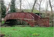  ??  ?? A railway station footbridge repurposed as a bridge across the pond in the grounds of David’s home. GARETH EVANS