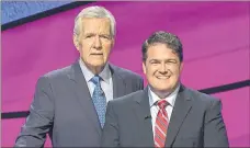  ?? SUBMITTED PHOTO ?? Summerside native Jonathan Greenan, front, with Jeopardy! gameshow host Alex Trebek.