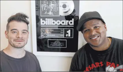  ?? K.M. Cannon Las Vegas Review-Journal@KMCannonPh­oto ?? “Intentions” hit No. 1 on Billboard’s Pop Songs airplay chart June 27, giving local production duo The Audibles (Jimmy “Jimmy G” Giannos, left, and Dominic “DJ” Jordan) their first chart-topper.